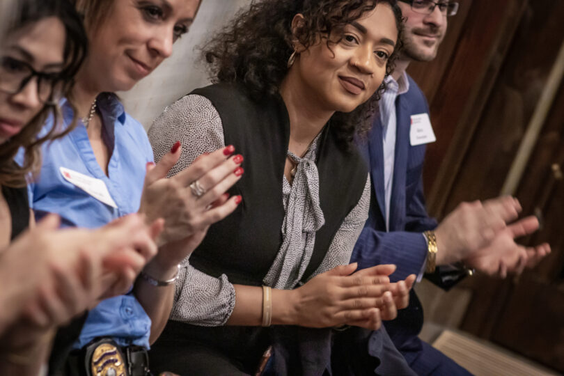 Young student raising his hand